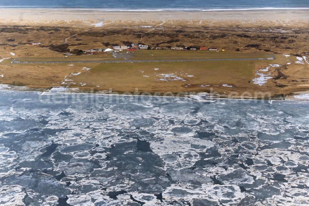 Aerial photograph Juist - Ice floe pieces of a drift ice layer on the water surface vor of Nordsee- Island Juist in the state Lower Saxony, Germany
