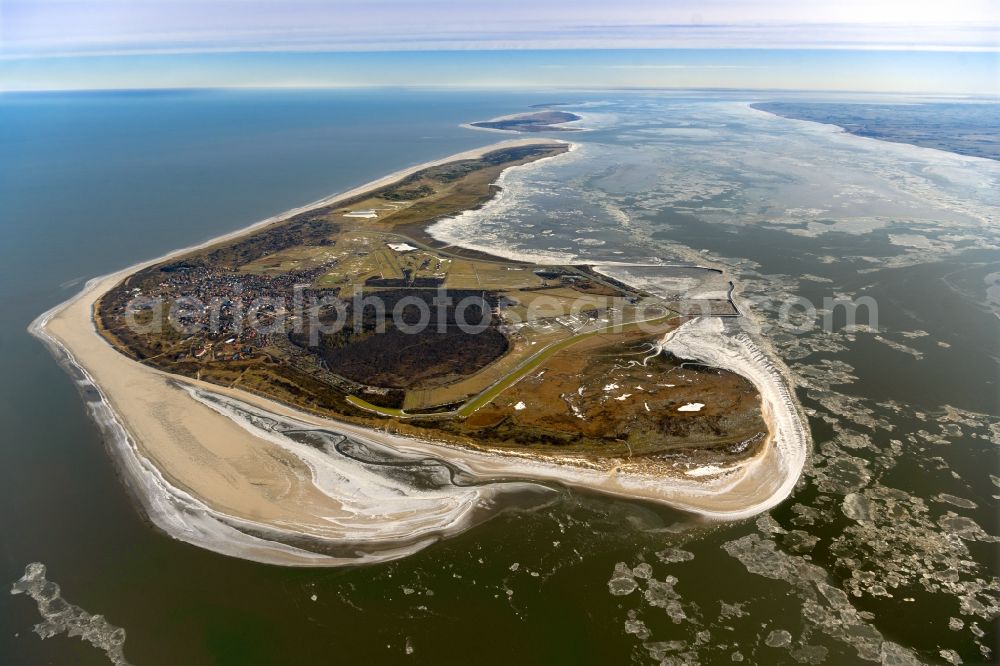 Aerial image Langeoog - Ice floe pieces of a drift ice layer on the water surface vor of Nordsee- Insel in Langeoog in the state Lower Saxony, Germany