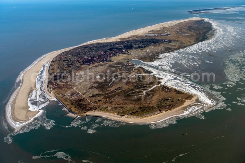 Spiekeroog from the bird's eye view: Ice floe pieces of a drift ice layer on the water surface vor of Nordsee- Insel in Spiekeroog in the state Lower Saxony, Germany