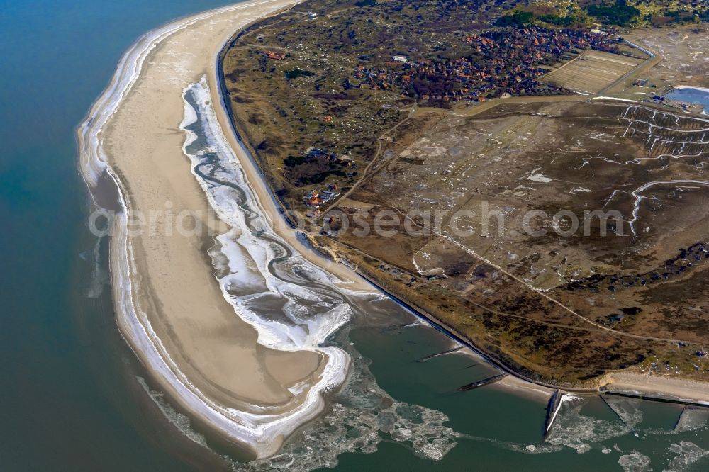 Aerial image Spiekeroog - Ice floe pieces of a drift ice layer on the water surface vor of Nordsee- Insel in Spiekeroog in the state Lower Saxony, Germany