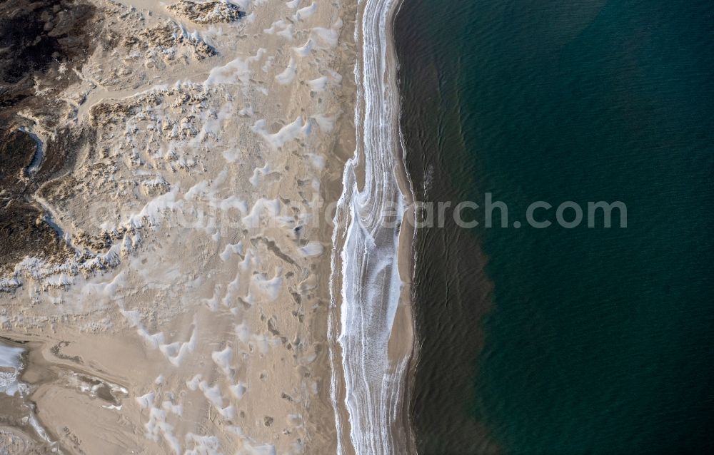 Aerial photograph Spiekeroog - Ice floe pieces of a drift ice layer on the water surface vor of Nordsee- Insel in Spiekeroog in the state Lower Saxony, Germany