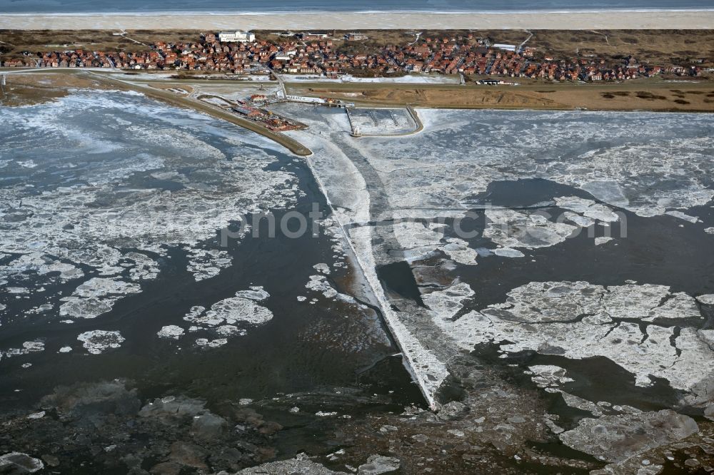 Aerial image Juist - Ice floe pieces of a drift ice layer on the water surface in Wattenmeer of Nordsee vor of Island Juist in the state Lower Saxony, Germany
