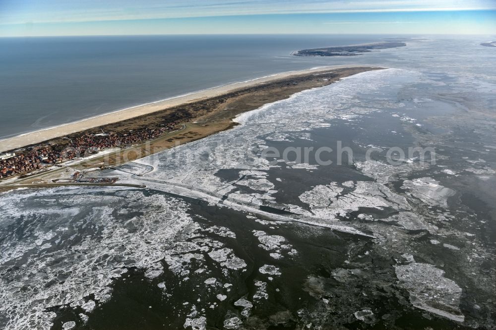Aerial photograph Juist - Ice floe pieces of a drift ice layer on the water surface in Wattenmeer of Nordsee vor of Island Juist in the state Lower Saxony, Germany
