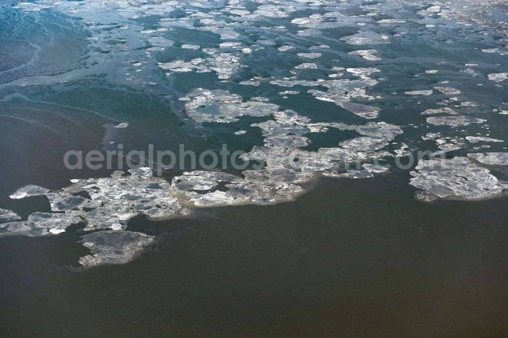 Aerial image Memmert - Ice floe pieces of a drift ice layer on the water surface in Wattenmeer of Nordsee vor of Island Memmert in the state Lower Saxony, Germany