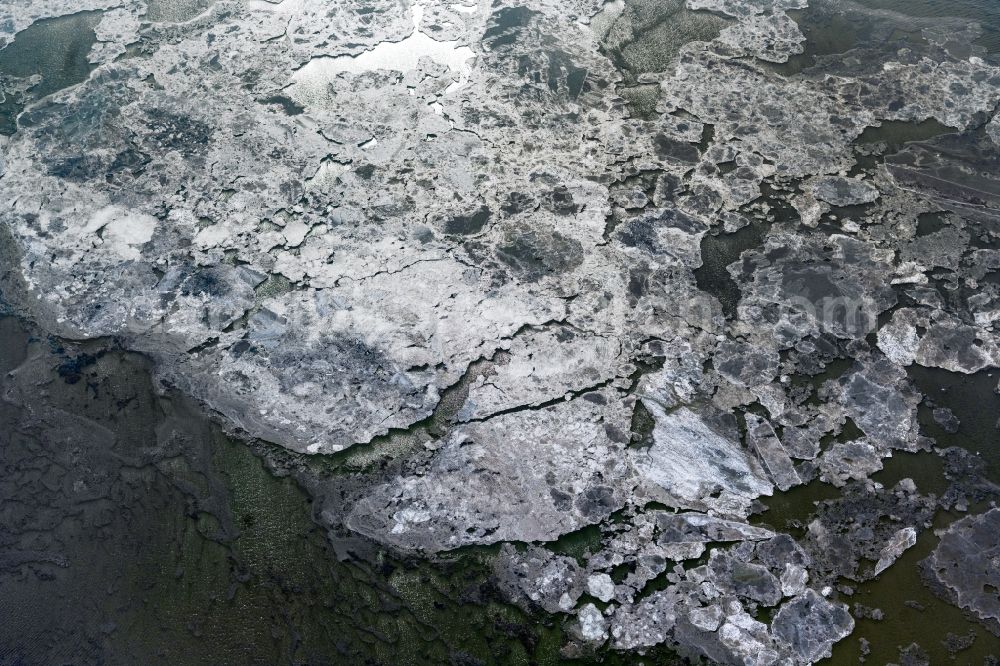 Aerial photograph Memmert - Ice floe pieces of a drift ice layer on the water surface in Wattenmeer of Nordsee vor of Island Memmert in the state Lower Saxony, Germany