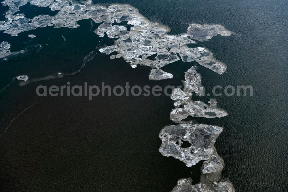 Memmert from above - Ice floe pieces of a drift ice layer on the water surface in Wattenmeer of Nordsee vor of Island Memmert in the state Lower Saxony, Germany