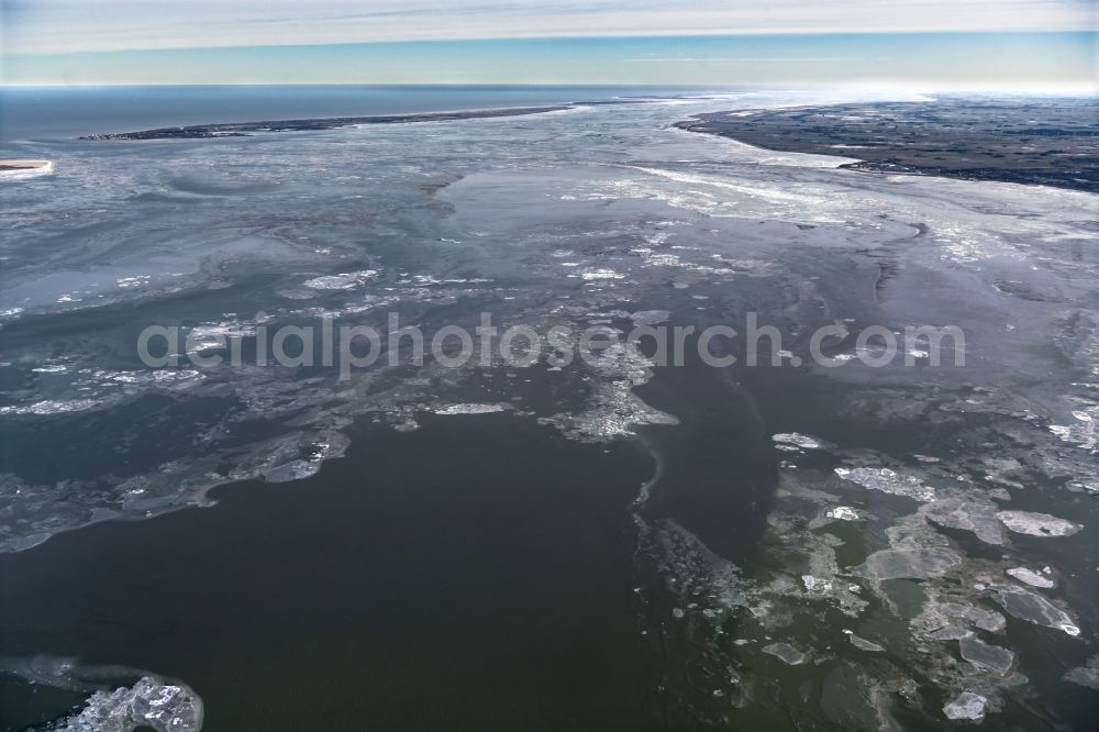 Aerial photograph Juist - Ice floe pieces of a drift ice layer on the water surface in the Wadden Sea of a??a??the North Sea between the island of Juist and the mainland in the state of Lower Saxony, Germany