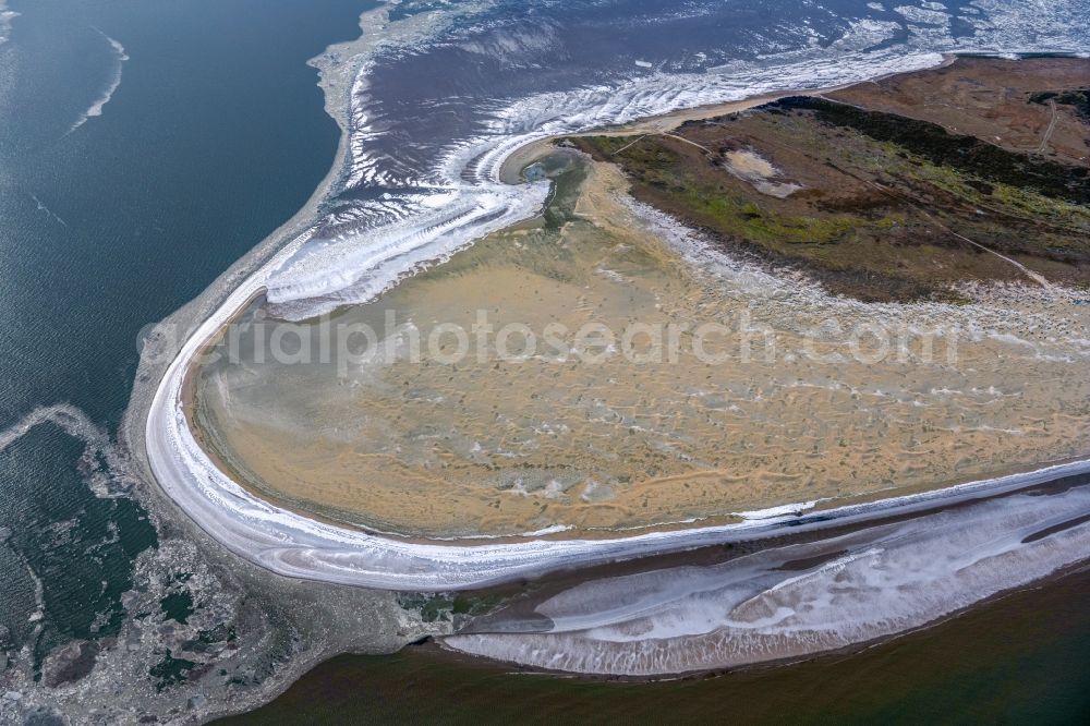 Spiekeroog from the bird's eye view: Ice floe pieces of a drift ice layer on the water surface on Westende of Nordsee- Island in Spiekeroog in the state Lower Saxony, Germany