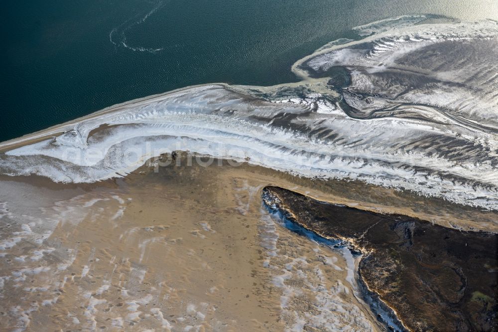 Spiekeroog from the bird's eye view: Ice floe pieces of a drift ice layer on the water surface on Westende of Nordsee- Island in Spiekeroog in the state Lower Saxony, Germany
