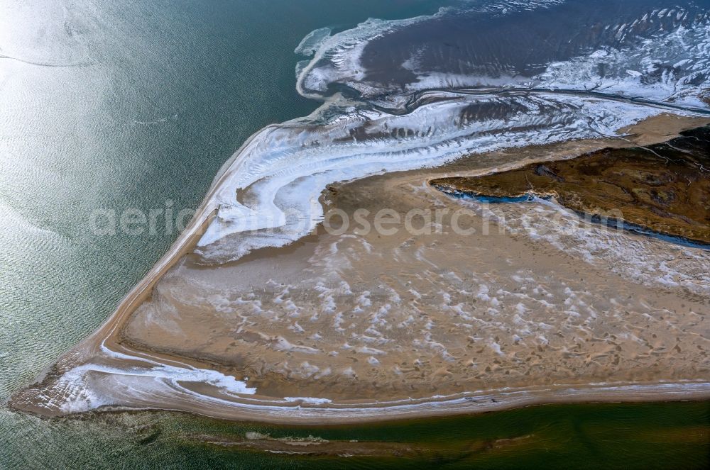 Aerial image Spiekeroog - Ice floe pieces of a drift ice layer on the water surface on Westende of Nordsee- Island in Spiekeroog in the state Lower Saxony, Germany