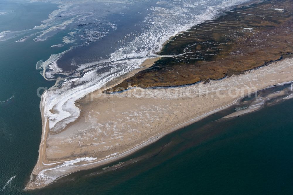 Aerial photograph Spiekeroog - Ice floe pieces of a drift ice layer on the water surface on Westende of Nordsee- Island in Spiekeroog in the state Lower Saxony, Germany