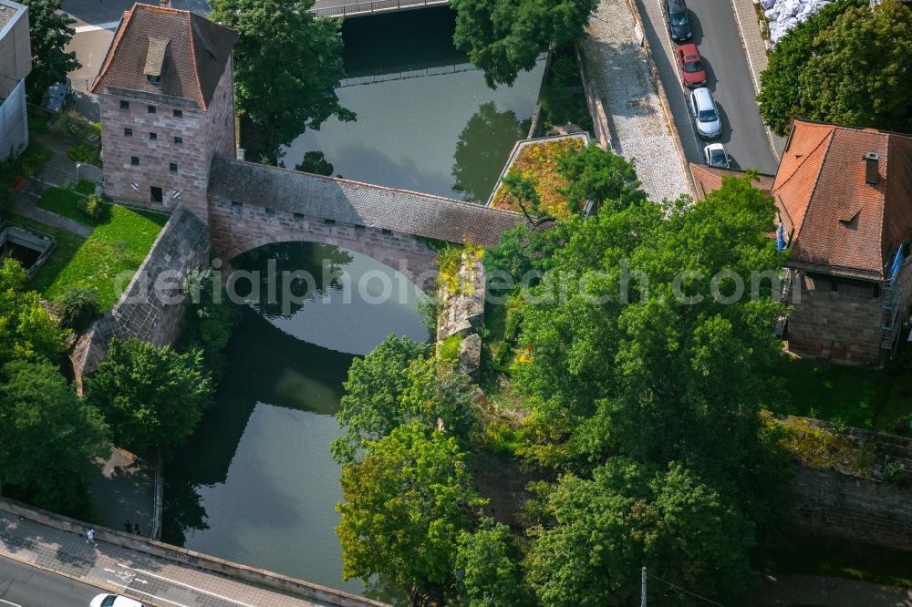 Nürnberg from the bird's eye view: Tower building with Bruecke over the Pegnitz with the rest of the former historic city walls on Marientormauer - Hintere Insel Schuett in the district Altstadt - Sankt Lorenz in Nuremberg in the state Bavaria, Germany