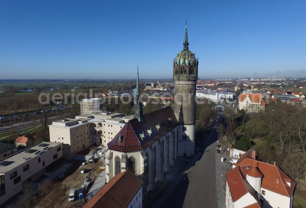 Lutherstadt Wittenberg from the bird's eye view: Castle church of Wittenberg with Gothic tower at the west end of the town is a UNESCO World Heritage Site