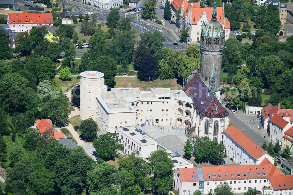 Lutherstadt Wittenberg from the bird's eye view: Castle church of Wittenberg. The castle with its 88 m high Gothic tower at the west end of the town is a UNESCO World Heritage Site. It gained fame as the Wittenberg Augustinian monk and theology professor Martin Luther spread his disputation