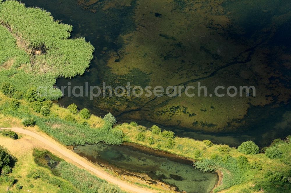 Aerial image Kelbra (Kyffhäuser) - North West of the mountains the Kyffhaeuser Kelbra Dam is located in the federal state of Saxony-Anhalt. The river is dammed to a reservoir. The lake is a popular recreational center and is adjacent to the flood protection of fisheries