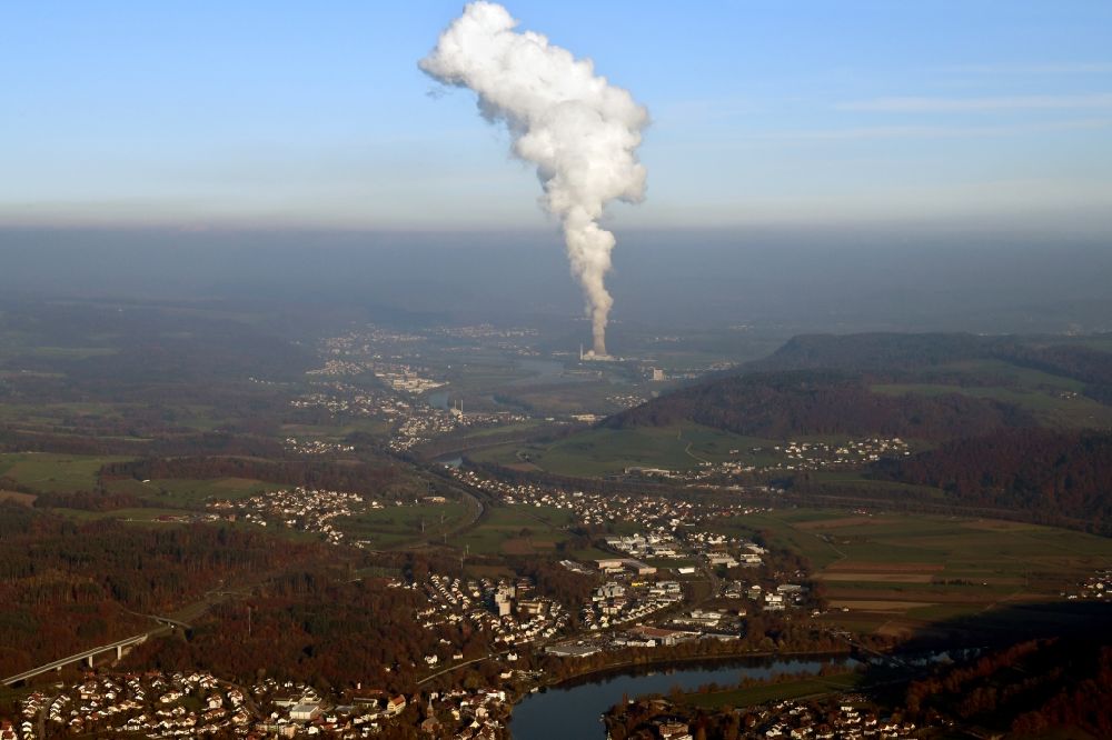 Laufenburg from above - Landscape at the Rhine - river in Laufenburg in the state Baden-Wurttemberg, Germany. Steam column of the NPP nuclear power plant KKL Leibstadt in Switzerland