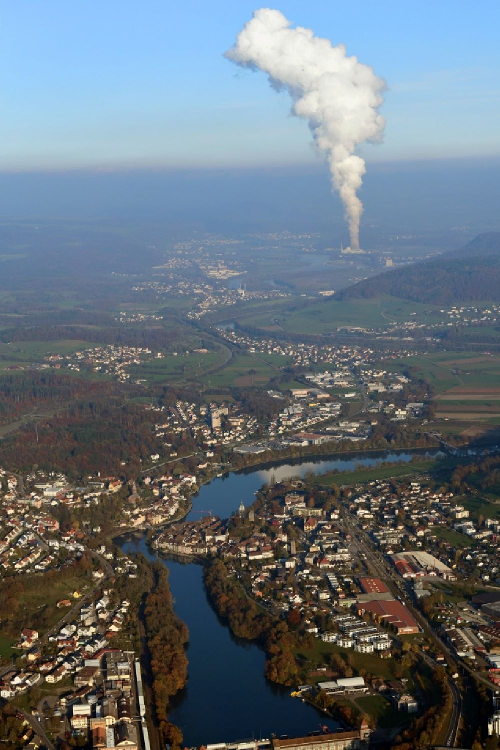 Aerial image Laufenburg - Landscape at the Rhine - river in Laufenburg in the state Baden-Wurttemberg, Germany. Steam column of the NPP nuclear power plant KKL Leibstadt in Switzerland