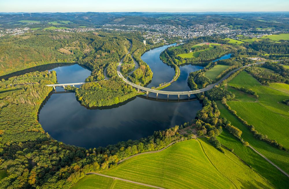 Olpe from the bird's eye view: Curved loop of the riparian zones on the course of the river Bigge on street B54 in Olpe at Sauerland in the state North Rhine-Westphalia, Germany