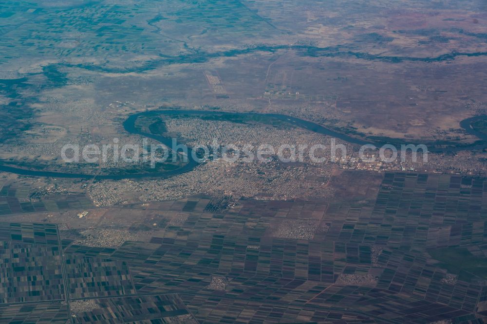Aerial photograph Wad Madani - Curved loop of the riparian zones on the course of the river Blauer Nil in Wad Madani in al-Dschazira, Sudan