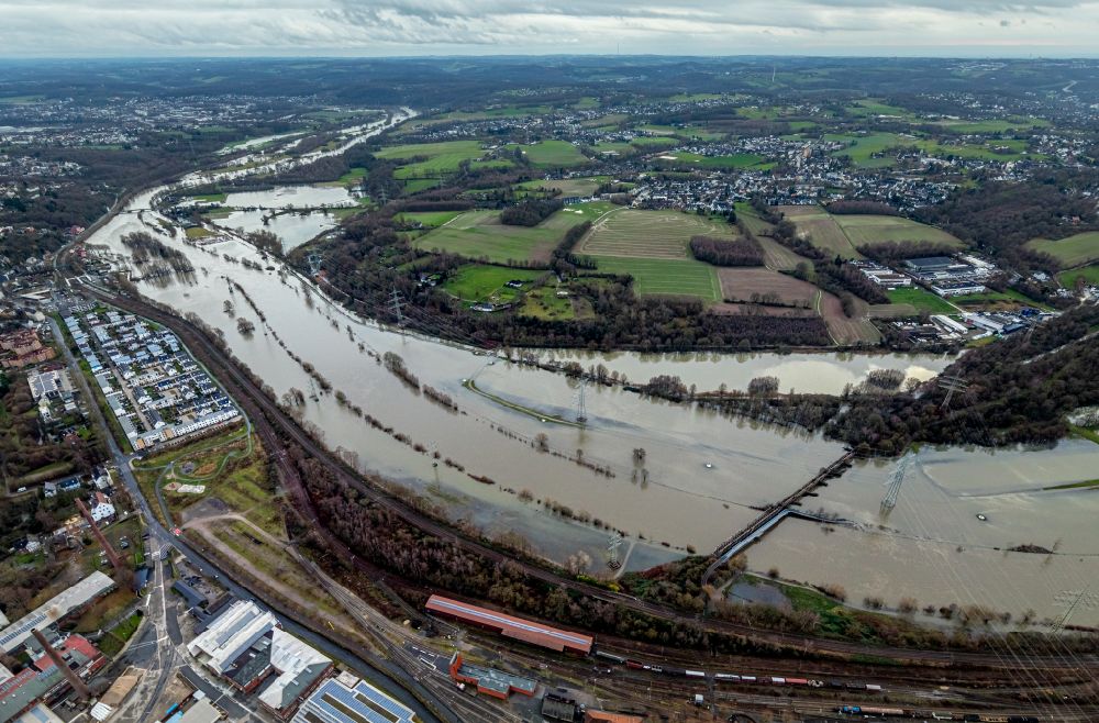 Essen from above - Shore areas with flooded by flood level riverbed the Ruhr in the district Burgaltendorf in Essen at Ruhrgebiet in the state North Rhine-Westphalia, Germany