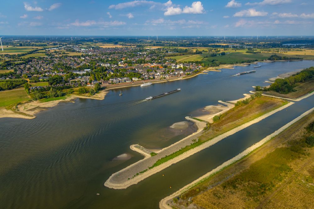 Kalkar from above - Shore areas exposed by low-water level riverbed in Kalkar in the state North Rhine-Westphalia, Germany