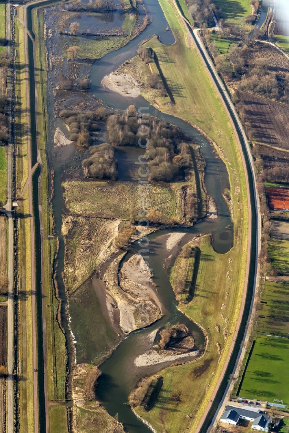 Teningen from above - Curved loop of the riparian zones on the course of the river Elzdamm of Elz in Teningen in the state Baden-Wurttemberg, Germany