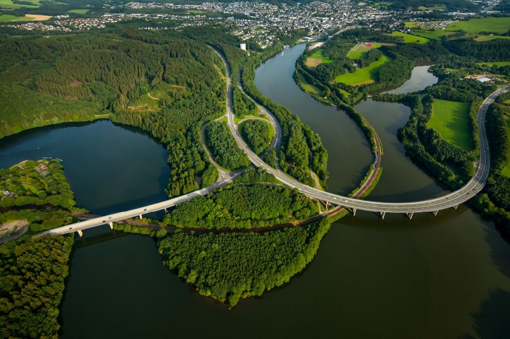 Olpe from the bird's eye view: Riparian zones on the course of the river Bigge with various bridges in Olpe in the state North Rhine-Westphalia