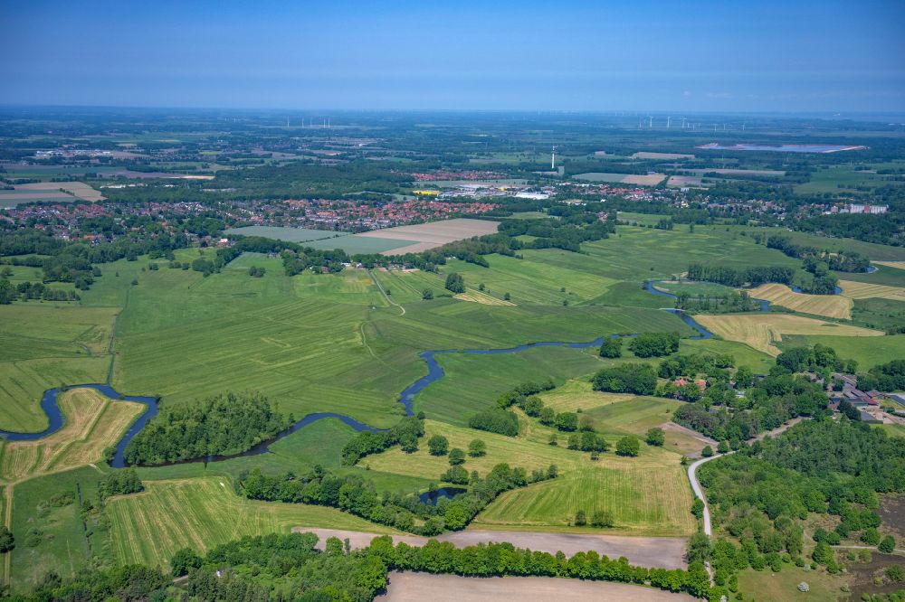 Stade from above - Curved loop of the riparian zones on the course of the river in Stade in the state Lower Saxony, Germany