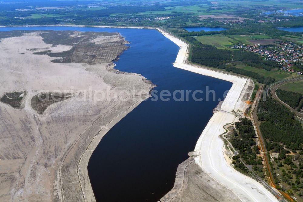 Teichland from above - Shore areas of flooded former lignite opencast mine and renaturation lake Cottbuser Ostsee in Teichland in the state Brandenburg, Germany
