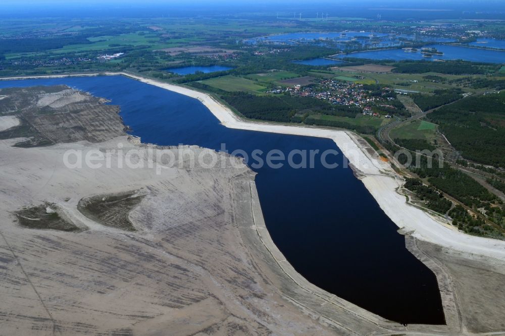 Teichland from the bird's eye view: Shore areas of flooded former lignite opencast mine and renaturation lake Cottbuser Ostsee in Teichland in the state Brandenburg, Germany