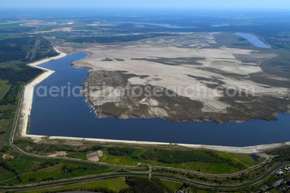 Aerial photograph Willmersdorf - Shore areas of flooded former lignite opencast mine and renaturation lake Cottbuser Ostsee in Willmersdorf in the state Brandenburg, Germany