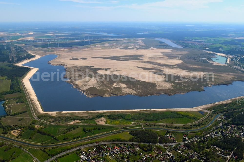 Willmersdorf from the bird's eye view: Shore areas of flooded former lignite opencast mine and renaturation lake Cottbuser Ostsee in Willmersdorf in the state Brandenburg, Germany