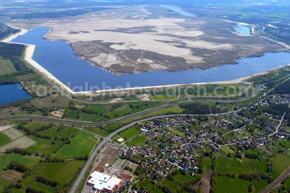 Aerial image Willmersdorf - Shore areas of flooded former lignite opencast mine and renaturation lake Cottbuser Ostsee in Willmersdorf in the state Brandenburg, Germany