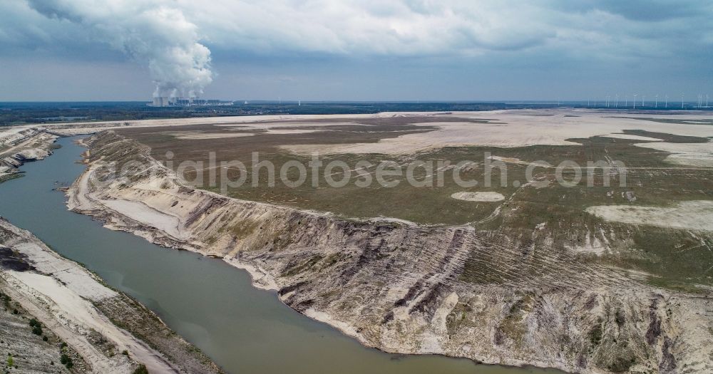 Dissenchen from above - Shore areas of flooded former lignite opencast mine and renaturation lake Baltic Sea in Dissenchen in the state Brandenburg, Germany