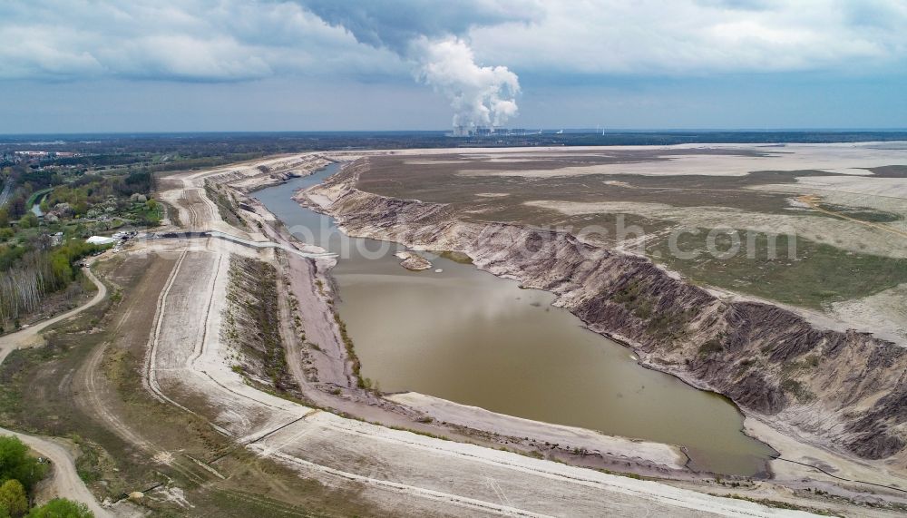 Aerial image Dissenchen - Shore areas of flooded former lignite opencast mine and renaturation lake Baltic Sea in Dissenchen in the state Brandenburg, Germany