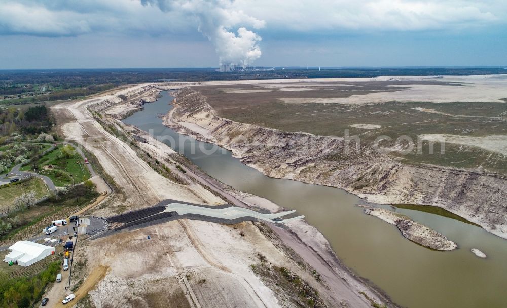 Aerial photograph Dissenchen - Shore areas of flooded former lignite opencast mine and renaturation lake Baltic Sea in Dissenchen in the state Brandenburg, Germany
