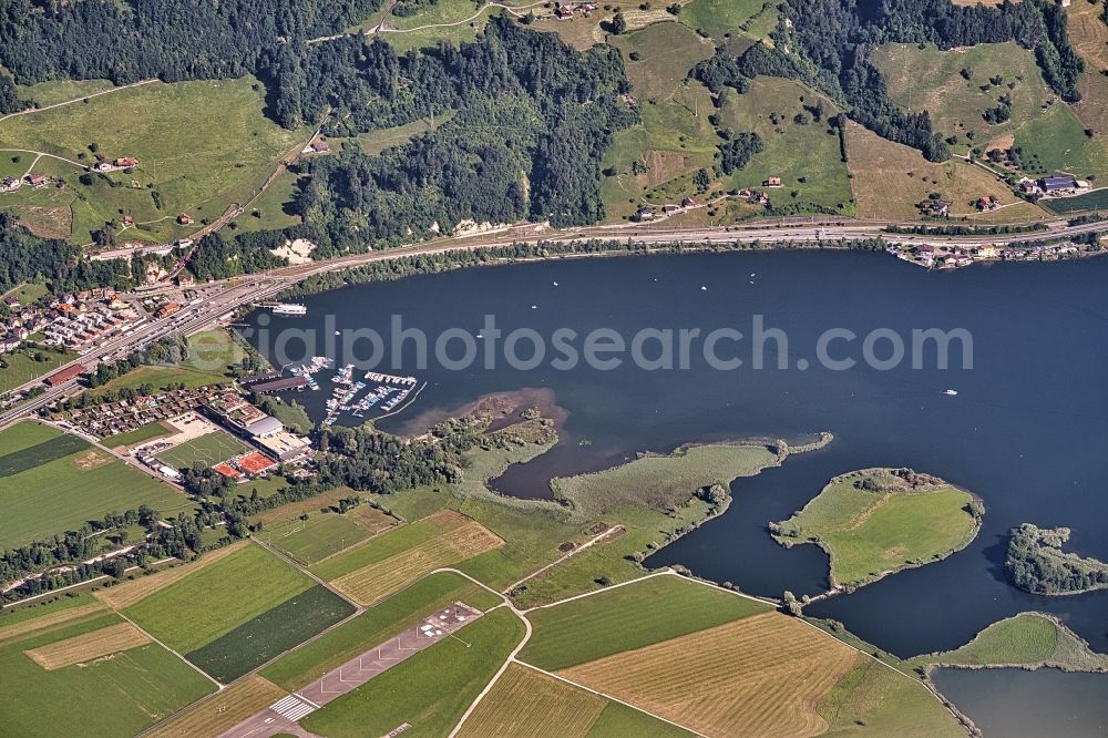 Aerial photograph Alpnach - Riparian areas on the lake area of bei Alpnachstad on Luzerner See in Alpnach in the canton Obwalden, Switzerland