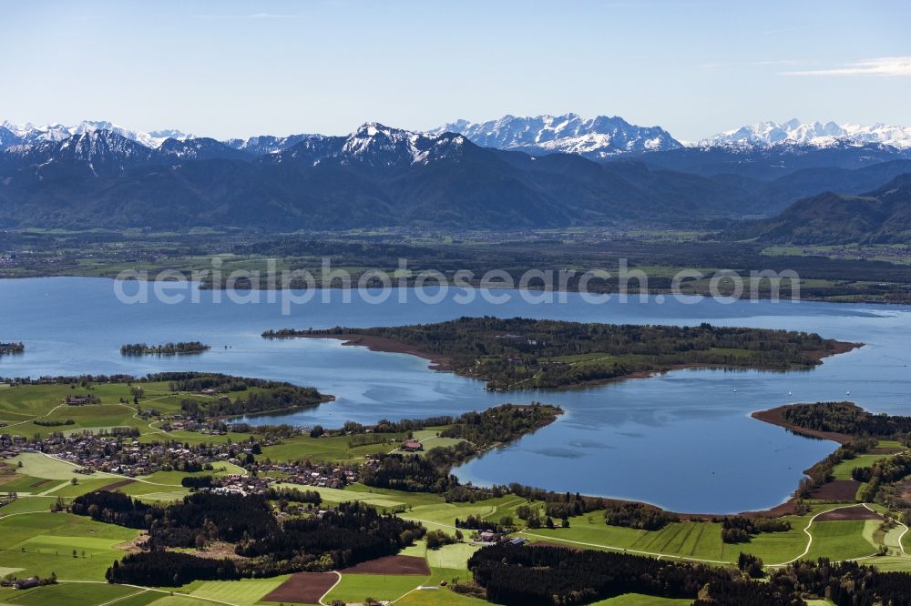 Breitbrunn am Chiemsee from above - Riparian areas on the lake area of Chiemsee with Blick auf die Herreninsel in Breitbrunn am Chiemsee in the state Bavaria, Germany