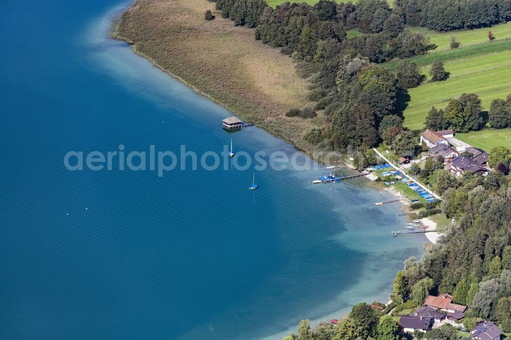 Breitbrunn am Chiemsee from the bird's eye view: Riparian areas on the lake area of Chiemsee in Breitbrunn am Chiemsee in the state Bavaria, Germany