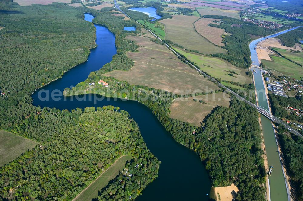 Aerial photograph Werbellin - Riparian areas on the lake area of Uedersee in a forest area in Werbellin at Schorfheide in the state Brandenburg, Germany