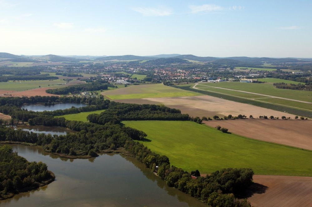 Kamenz from above - Riparian areas on the lake area of Deutsch-Baselitzer Grossteich in Kamenz in the state Saxony, Germany. In the background the Upper Lusatian hill country