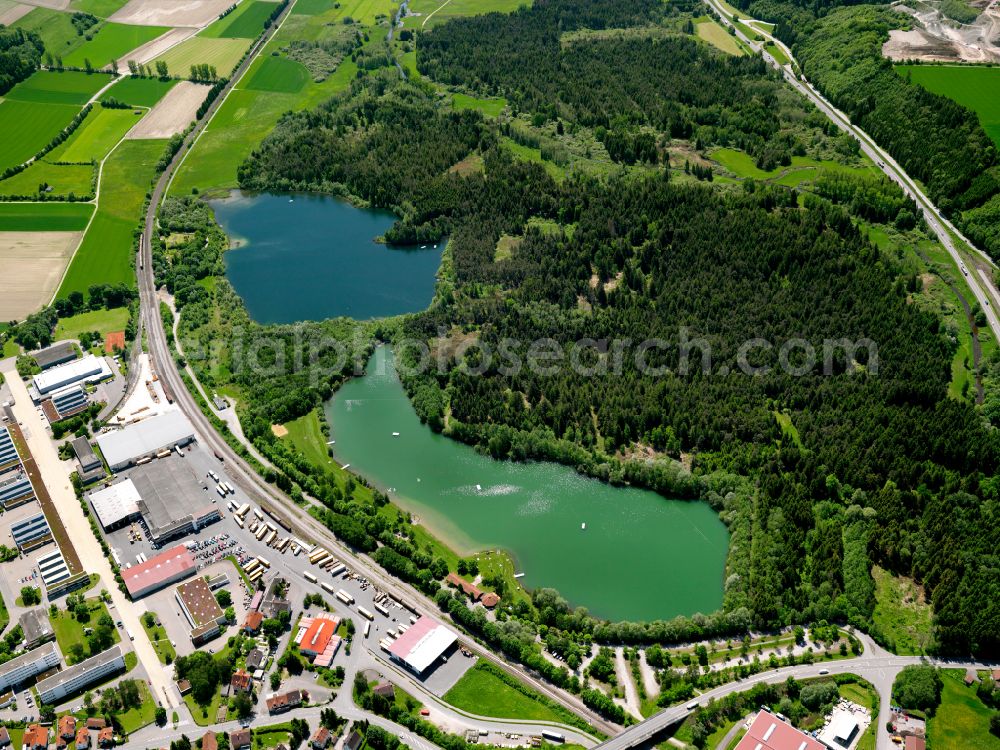Ummendorf from above - Riparian areas on the lake area of in a forest area in Ummendorf in the state Baden-Wuerttemberg, Germany
