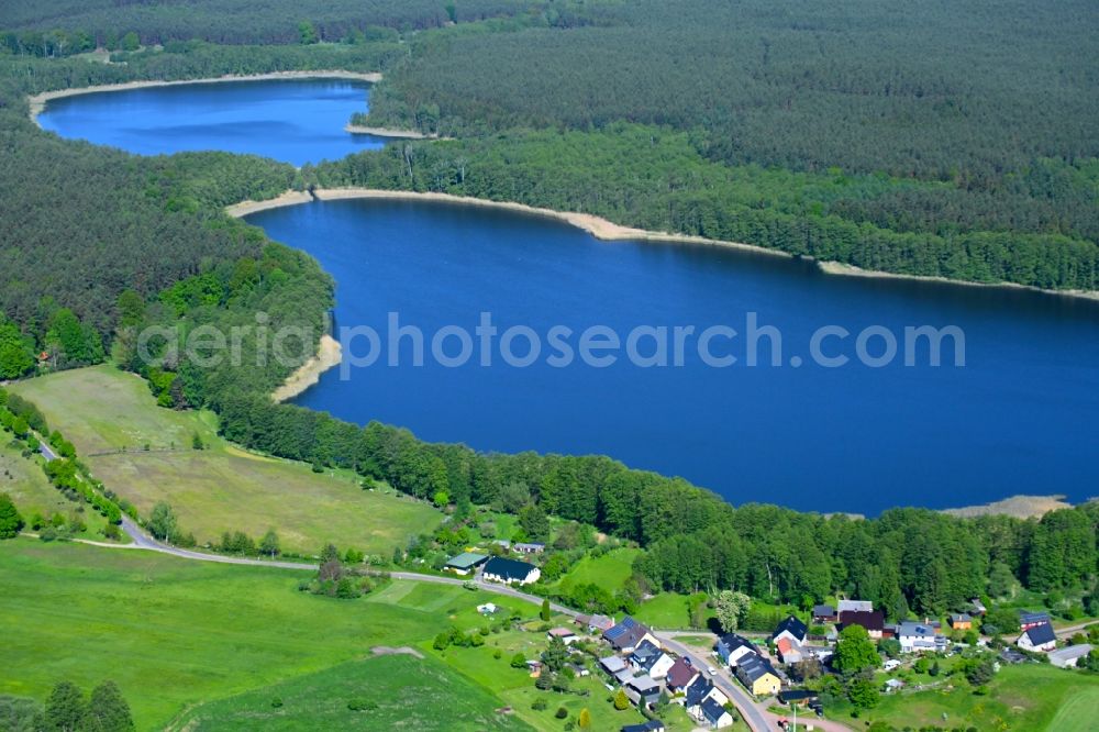 Aerial image Godendorf - Riparian areas on the lake area of Godendorfer See in a forest area in Godendorf in the state Mecklenburg - Western Pomerania, Germany