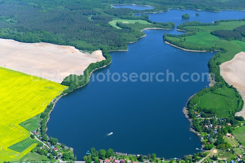 Priepert from the bird's eye view: Riparian areas on the lake area of Grosser Priepertsee in Priepert in the state Mecklenburg - Western Pomerania, Germany