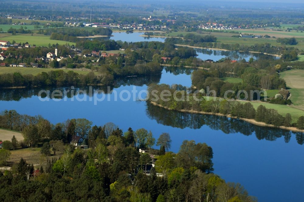 Aerial photograph Hammer - Riparian areas at the lake area of a??a??the Kuhpanzsee in Hammer in the state Brandenburg, Germany