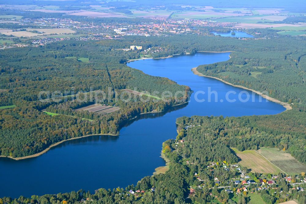 Ahrensdorf from above - Riparian areas on the lake area of Luebbesee in a forest area in Ahrensdorf in the state Brandenburg, Germany