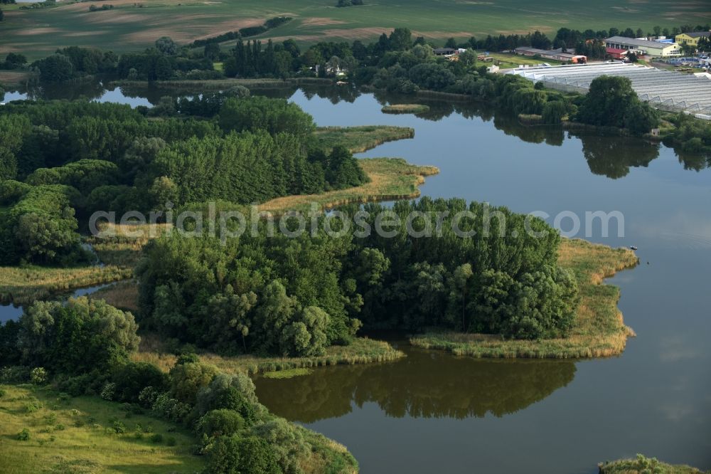 Aerial image Oberkrämer - Riparian areas on the lake area of Muehlensee in Oberkraemer in the state Brandenburg