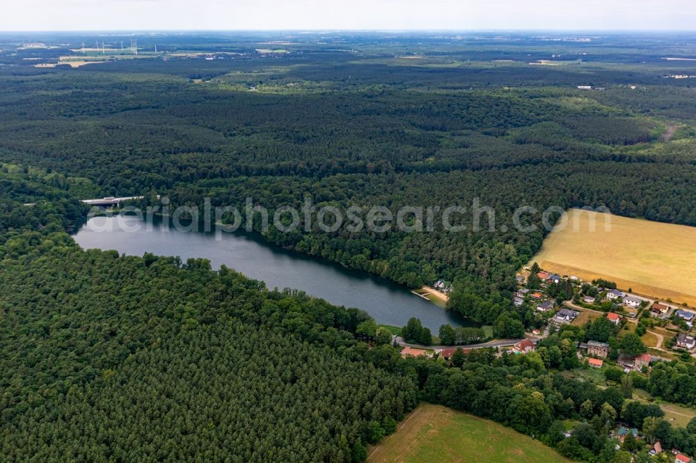 Wandlitz from the bird's eye view: Riparian areas on the lake area of Obersee in a forest area in Lanke in Wandlitz in the state Brandenburg, Germany