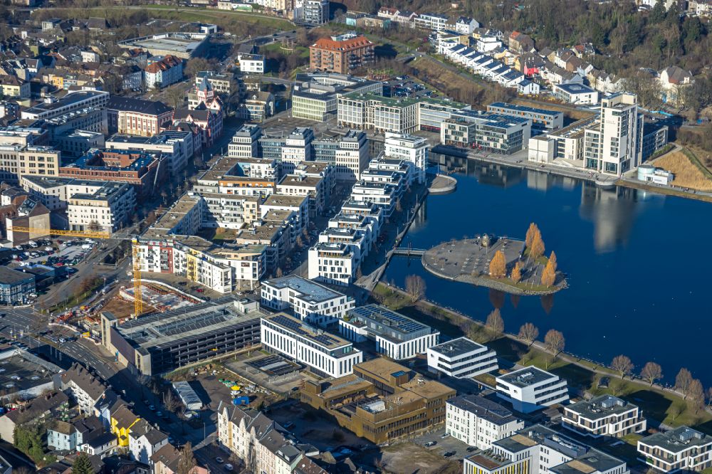 Aerial image Dortmund - Riparian areas on the lake area of Phoenixsee with nearby residential areas, a port and the castle Hoerder Burg in Dortmund in the state North Rhine-Westphalia