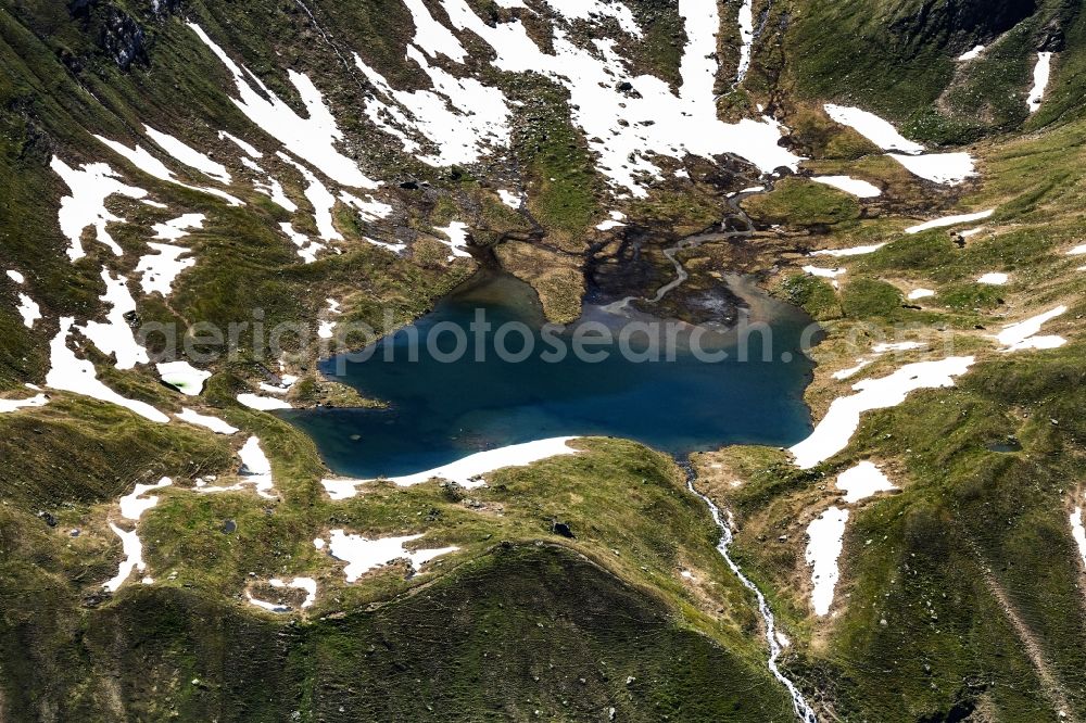 Raneburger See from above - Riparian areas on the lake area of Raneburger See in a forest area in in Tirol, Austria